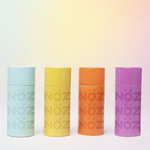 Load image into Gallery viewer, 4 front colorful NOZ nose stick sunscreen.
