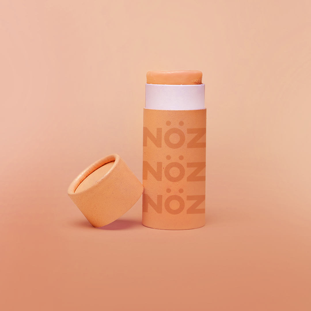 NOZ orange nose stick sunscreen.