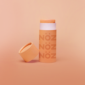 NOZ orange nose stick sunscreen.