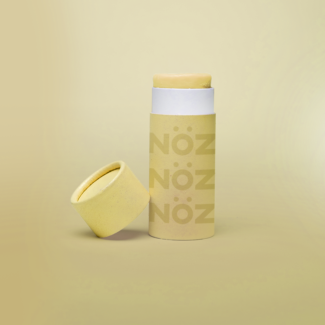 NOZ yellow  nose stick sunscreen.